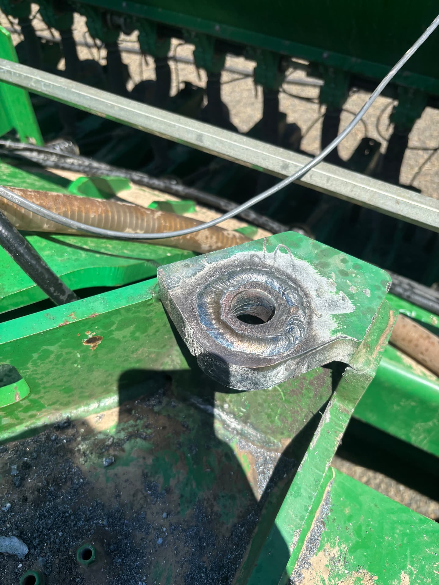 Welded repair completed on a hydraulic cylinder mounting boss
