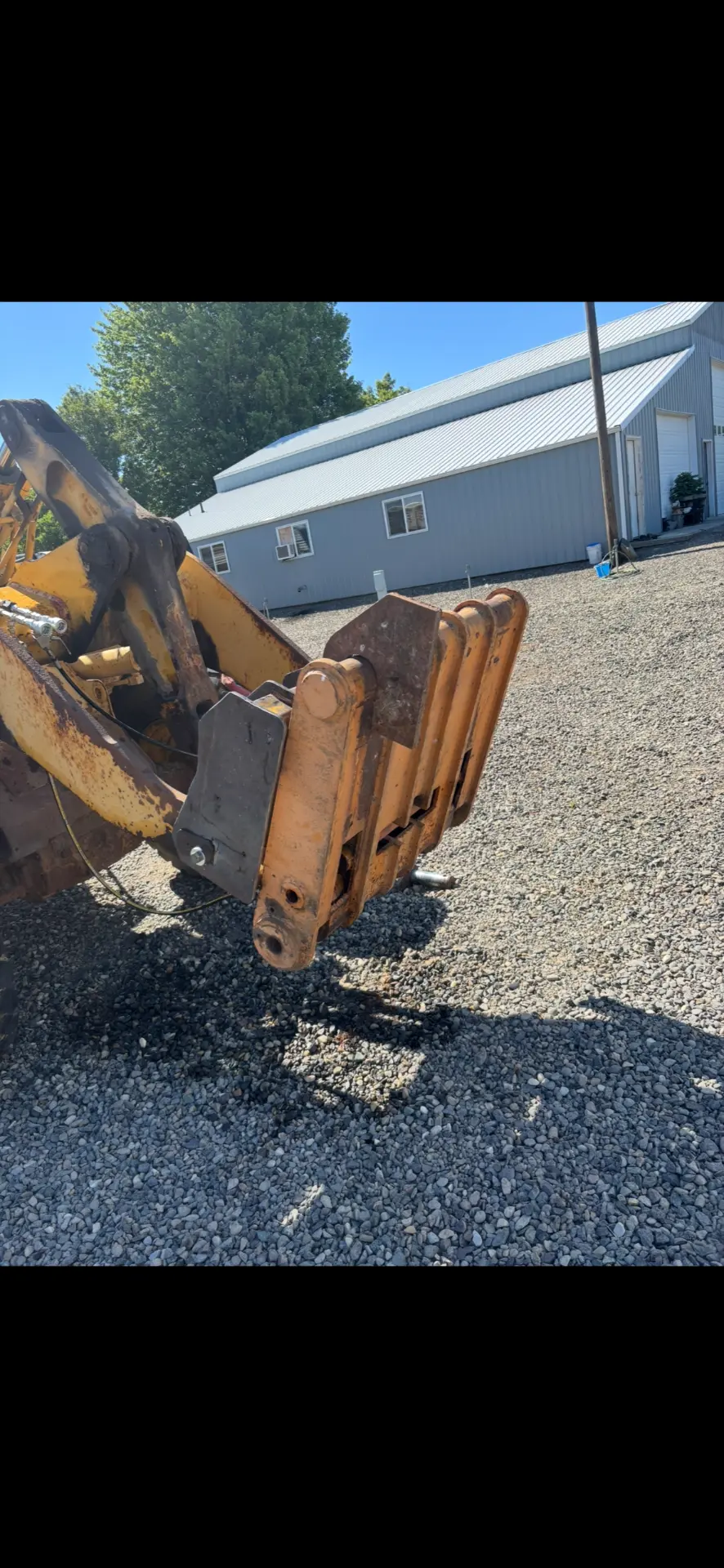 Heavy steel plate welded onto a wheel loader during repair
