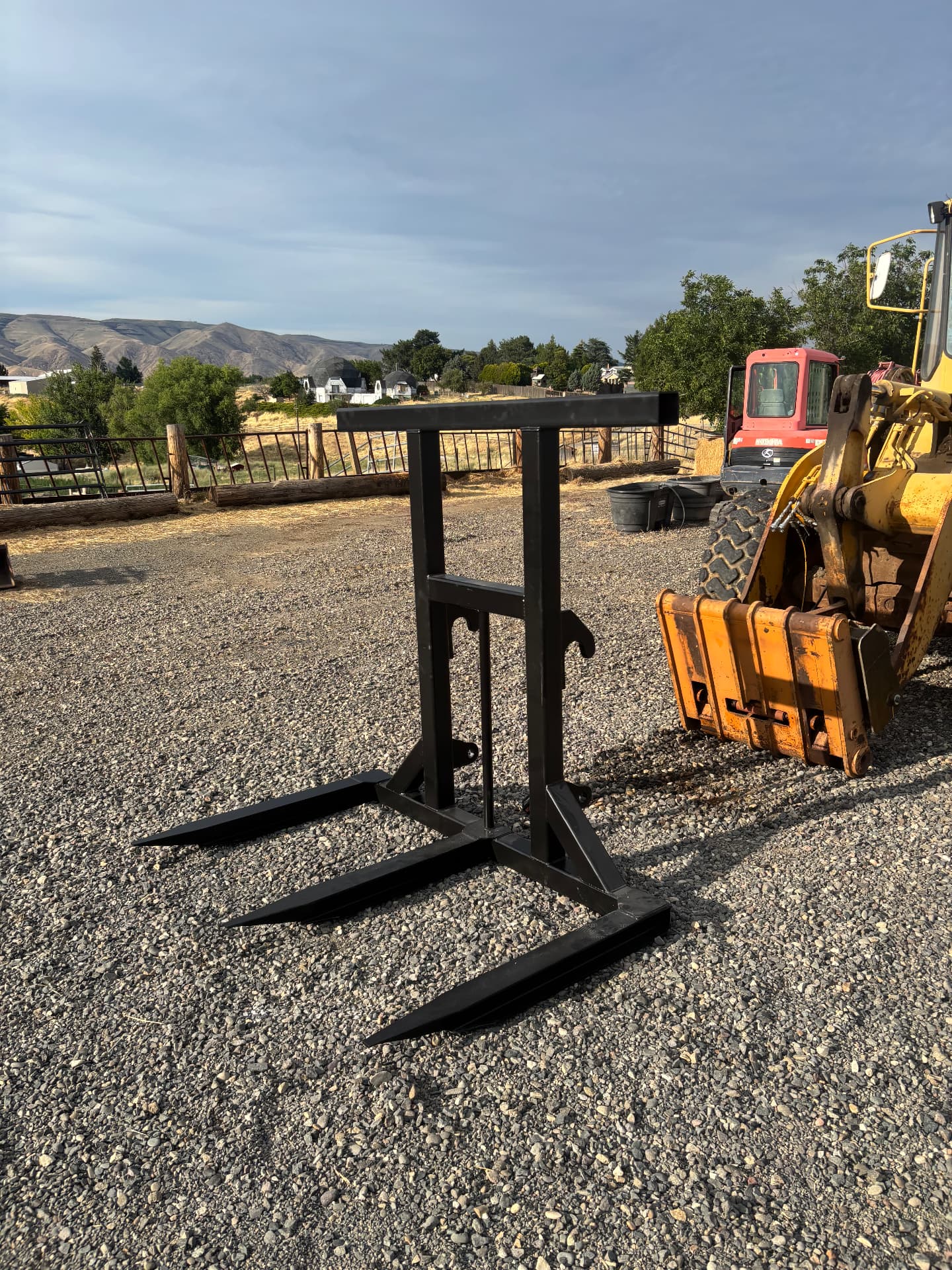Custom fabricated pallet fork attachment before installation